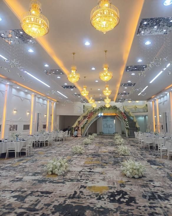 Hotel hall with chandeliers and decorative lighting